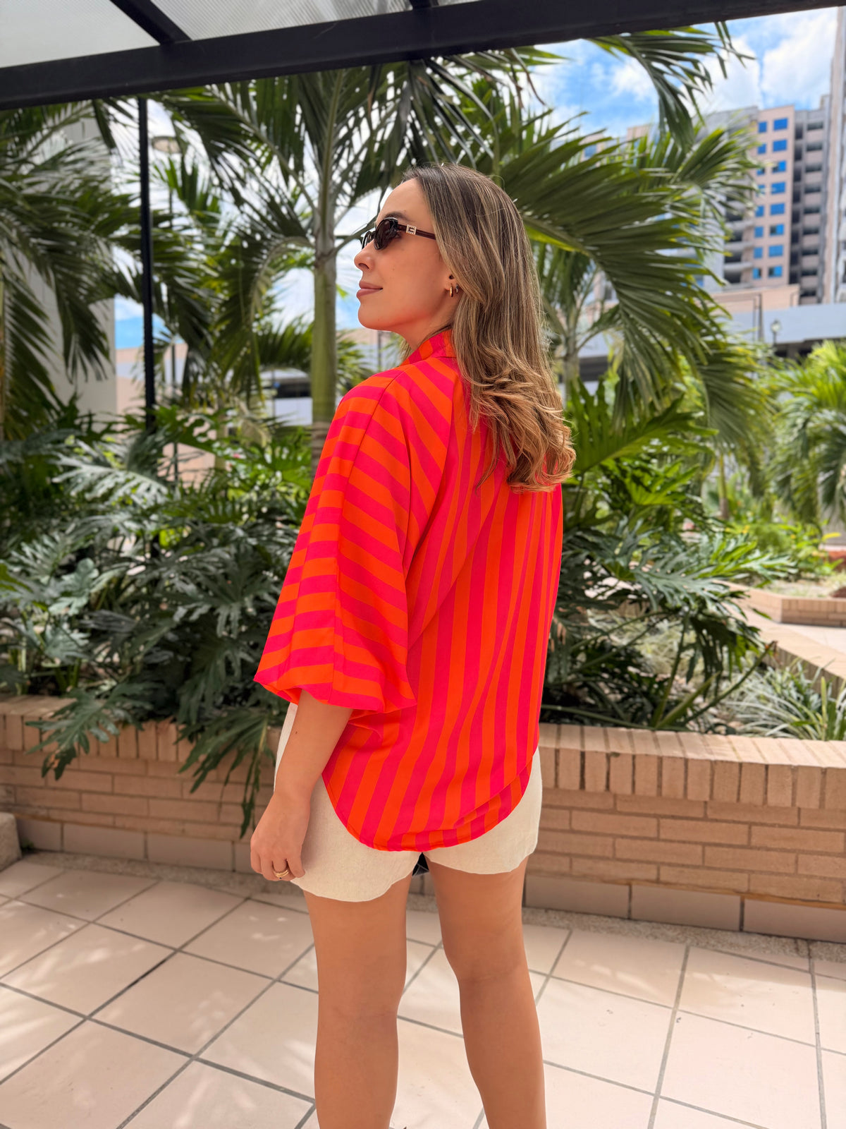 BLUSA EMMA RAYAS NARANJA FUCSIA
